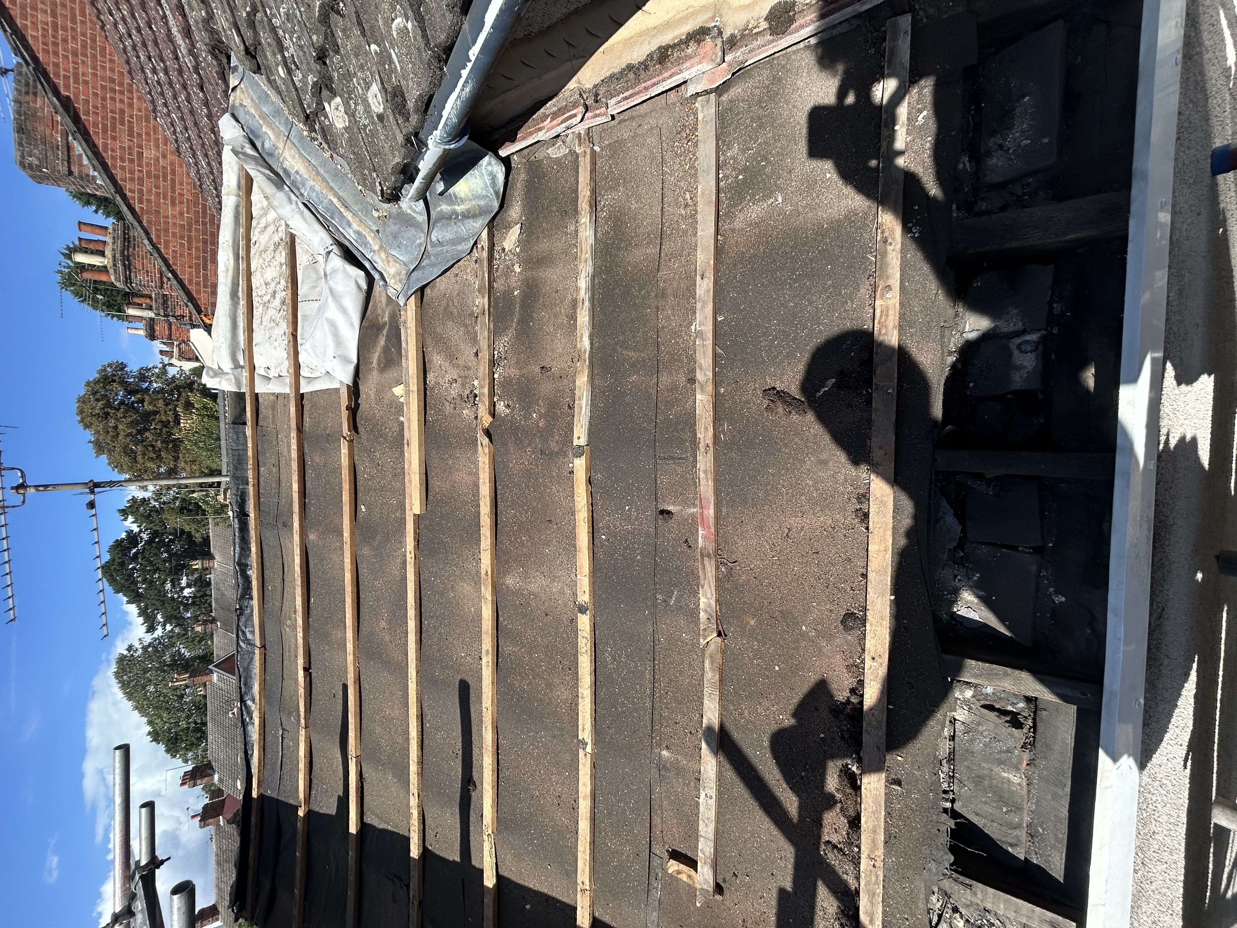 A worn roof photographed before MS One Build started work